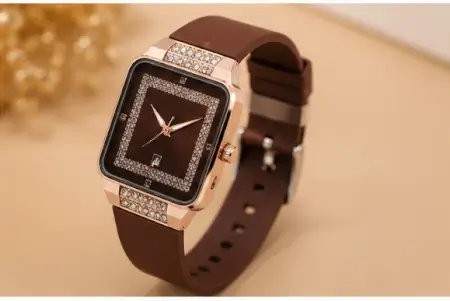 XzUJlTPnAOFNBE6xVYe6a7zlewmNwvR3HrR42tJG.webp Luxury Square Watch for Women & Girls – Brown Dial with Crystal Border | Stylish Silicon Strap Quartz Wristwatch ( brown, OS )
